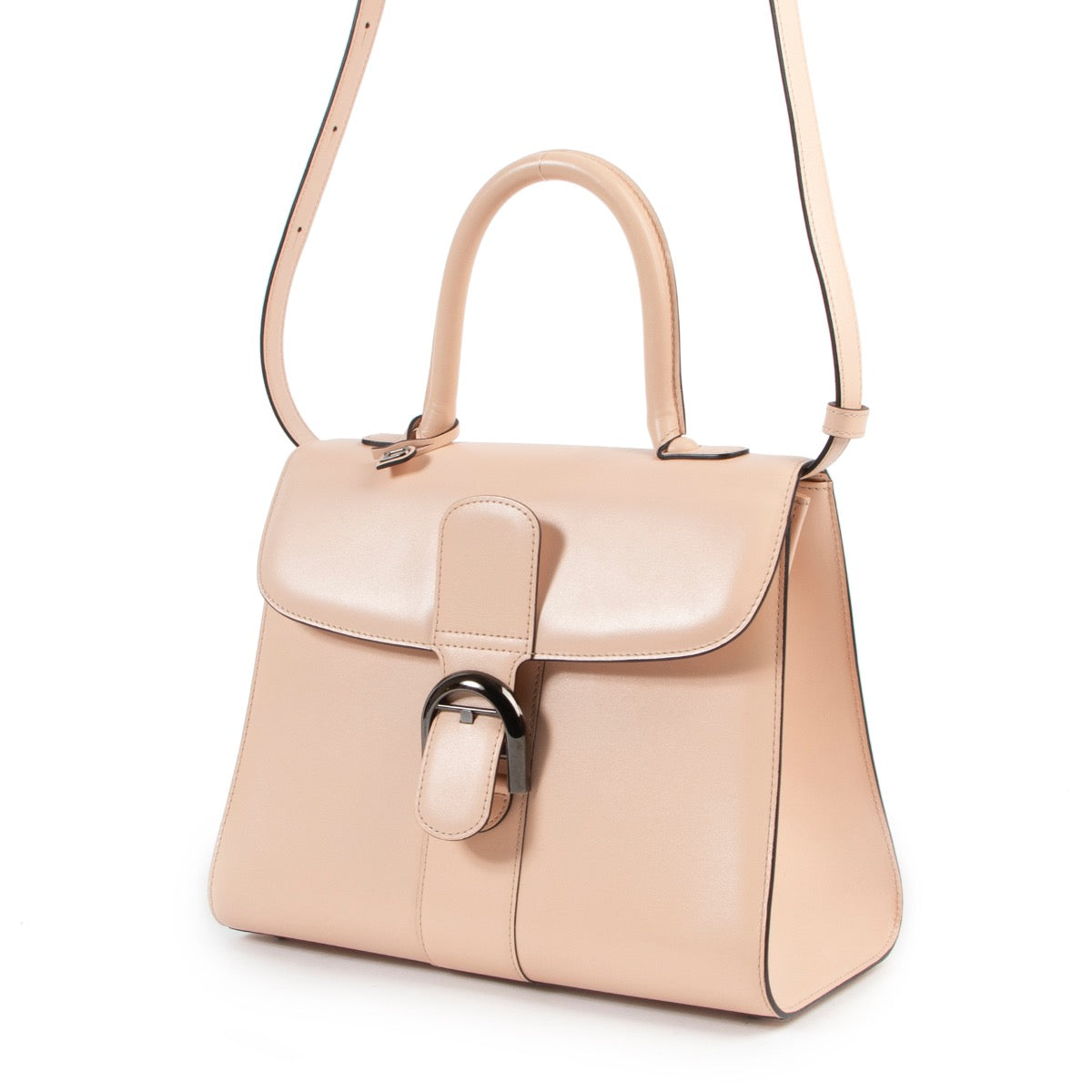 Achetez en ligne second main ce sac Delvaux Brilliant MM nude rose en très bon état.