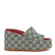 Are you looking for an authentic pair of designer Gucci Blue GG Supreme Platform Slide Sandals - Size 38?