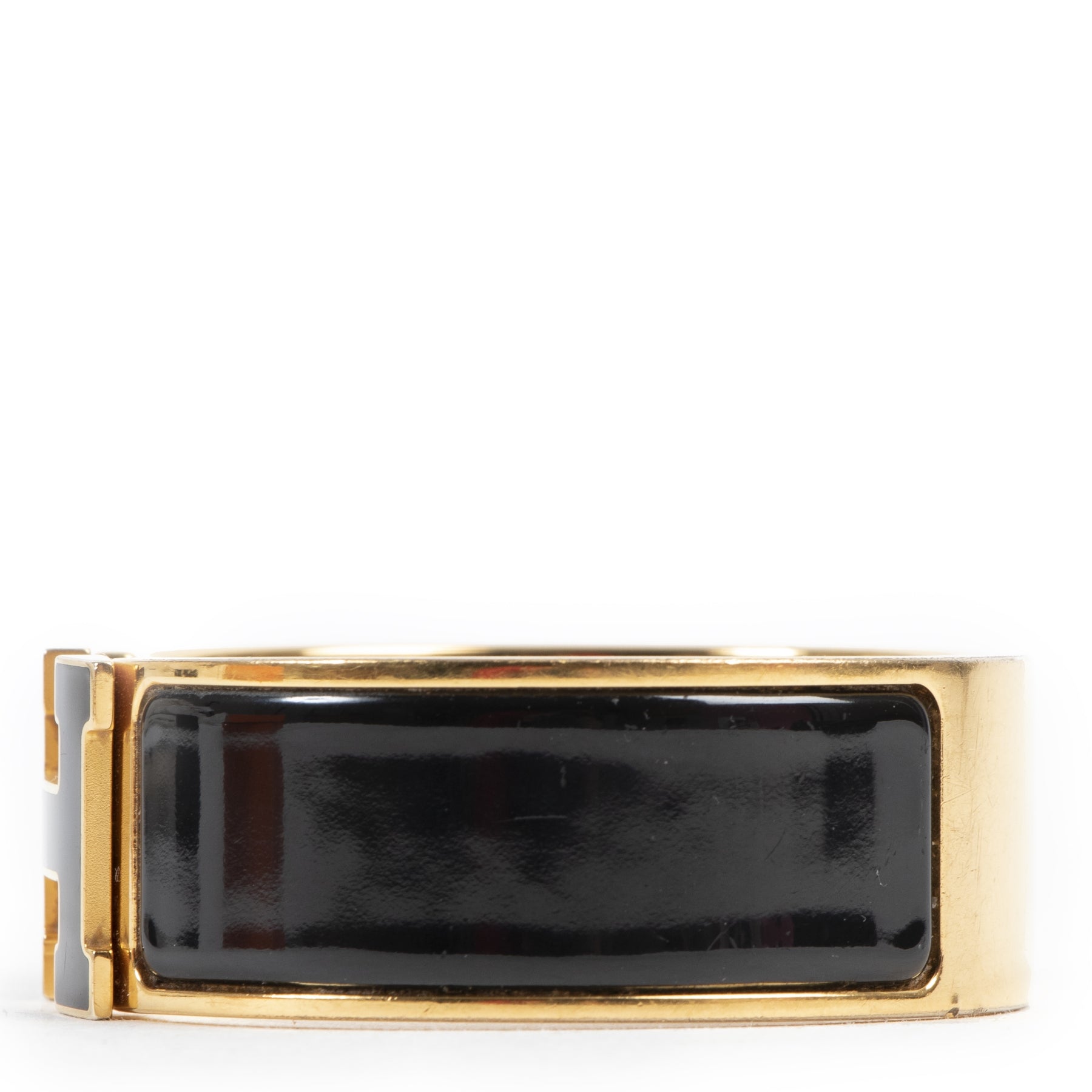 Buy this authentic second-hand vintage Hermès Black Clic Clac H Bracelet at online webshop LabelLOV. Safe and secure shopping. Koop deze authentieke tweedehands vintage Hermès Black Clic Clac H Bracelet bij online webshop LabelLOV.