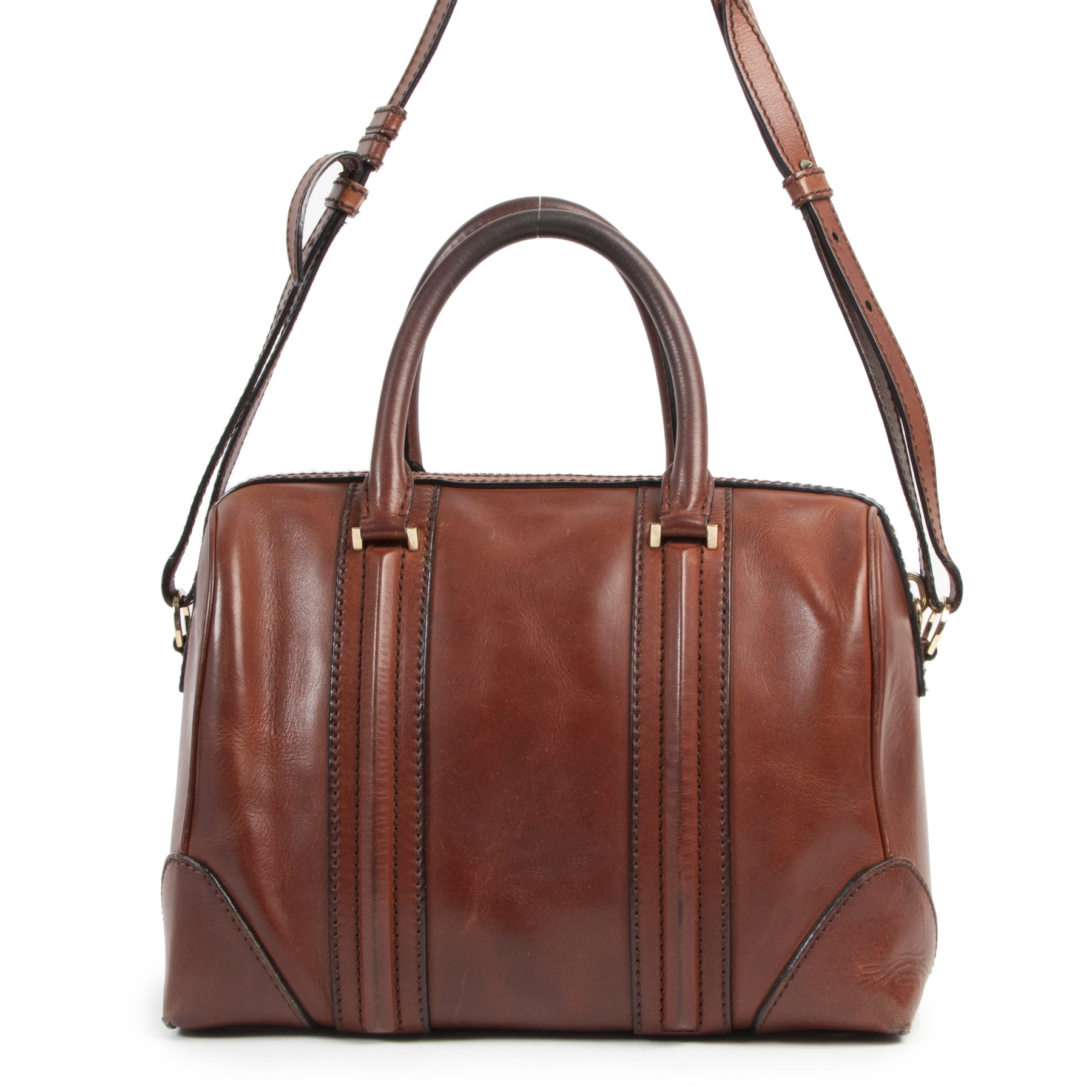 Buy this authentic second-hand vintage Givenchy Lucrezia Leather Bowling Bag at online webshop LabelLOV. Safe and secure shopping. Koop deze authentieke tweedehands vintage Givenchy Lucrezia Leather Bowling Bag bij online webshop LabelLOV.