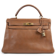 Buy this authentic second-hand vintage Hermès Kelly 32 Epsom Cognac at online webshop LabelLOV. Safe and secure shopping. Koop deze authentieke tweedehands vintage Hermès Kelly 32 Epsom Cognac bij online webshop LabelLOV.