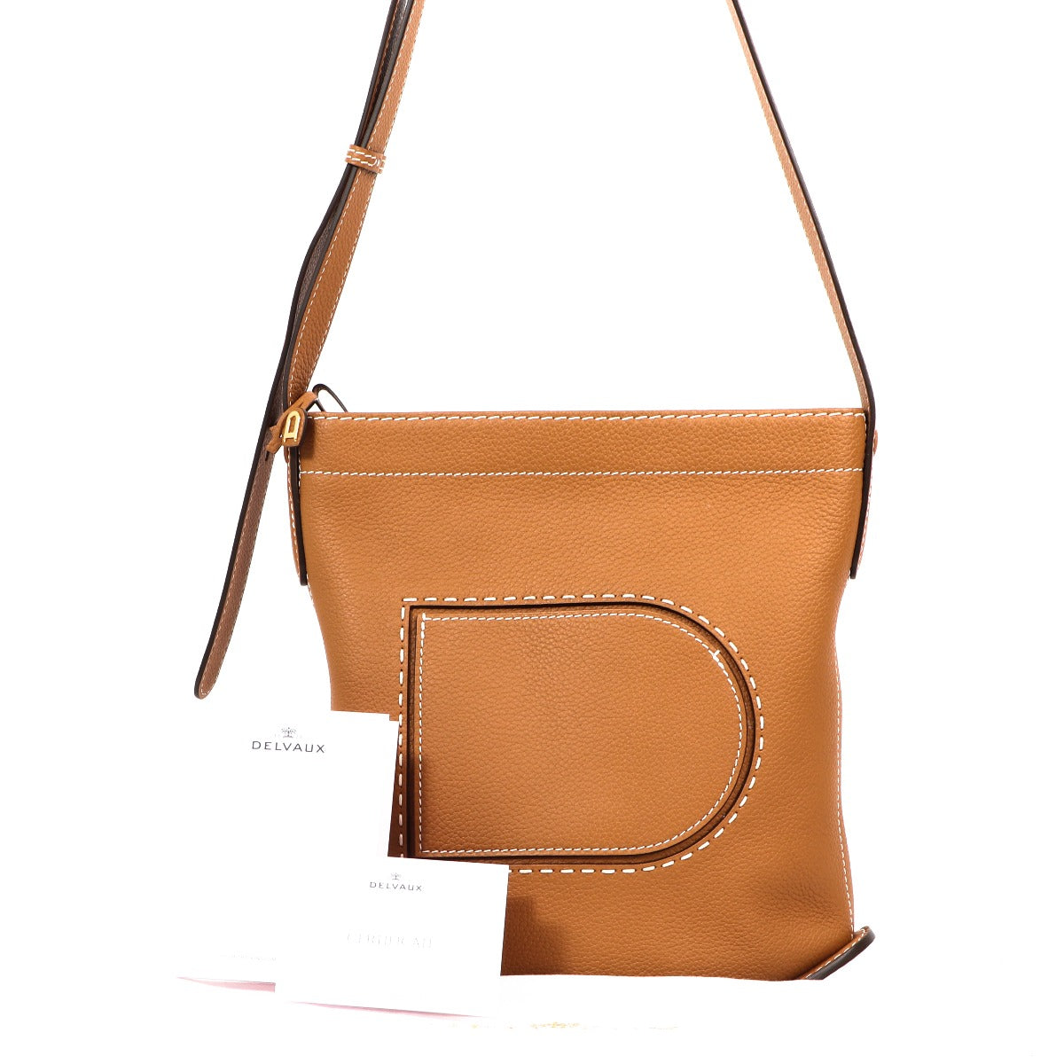 Buy an authentic second-hand Delvaux Cognac Taurillon Pin Daily Crossbody Bag in very good condition at Labellov in Antwerp.