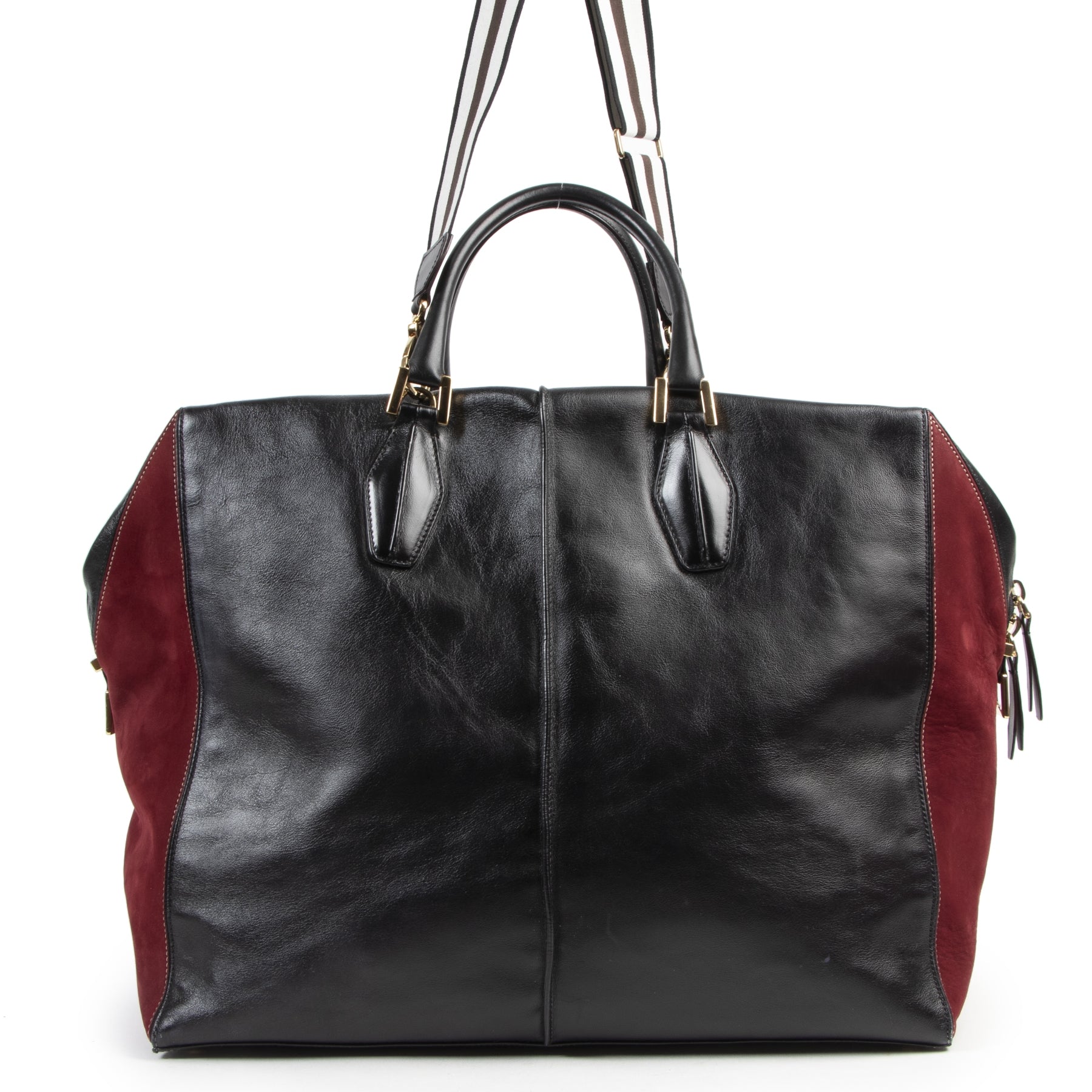 We buy and sell your preloved and new designer bags online Tod's Two-Tone Suede and Leather Travel Bag