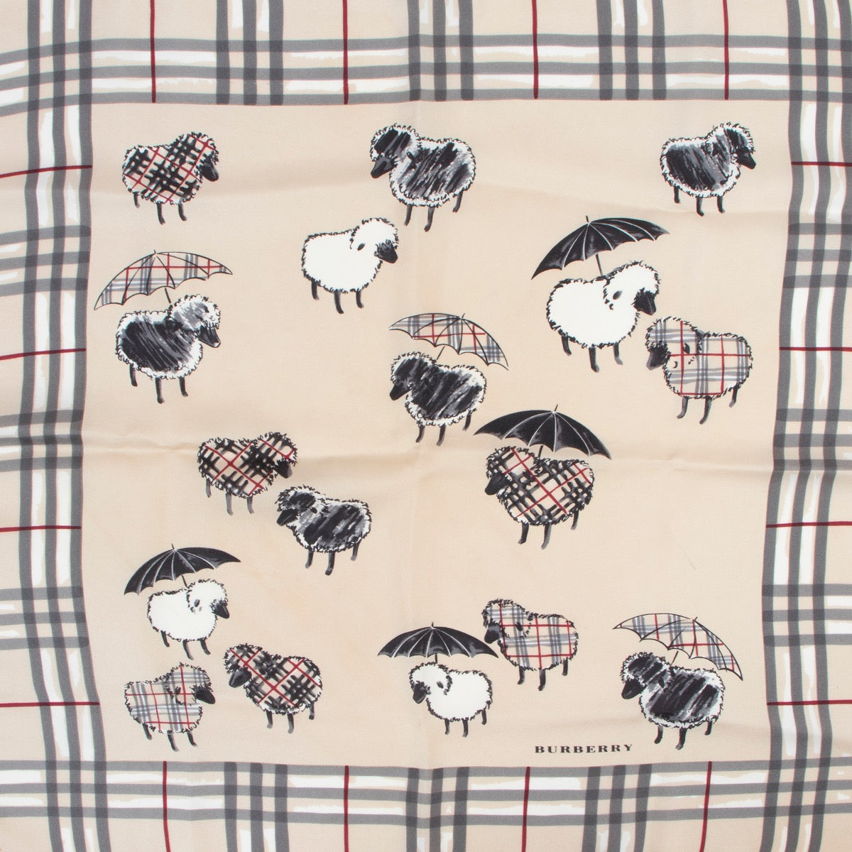 Shop an authentic second hand Burberry check sheep umbrella scarf at Labellov