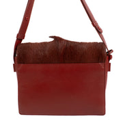 buy 100% authentic pre loved Delvaux Burgundy Springbok Madame PM Crossbody on Labellov.com