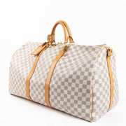 Shop the authentic Louis Vuitton Damier Azur Keepall Bandouliere 55 second hand on Labellov.com