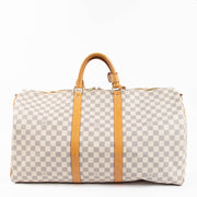 Shop the authentic Louis Vuitton Damier Azur Keepall Bandouliere 55 second hand on Labellov.com