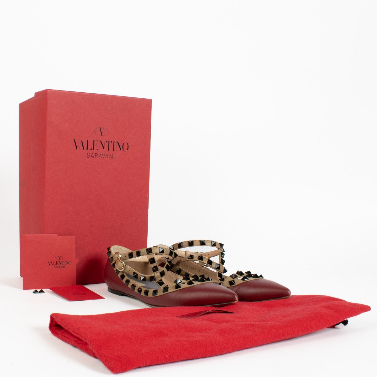 Shop the authentic Valentino Garavani Rockstud Burgundy Flats at Labellov.com