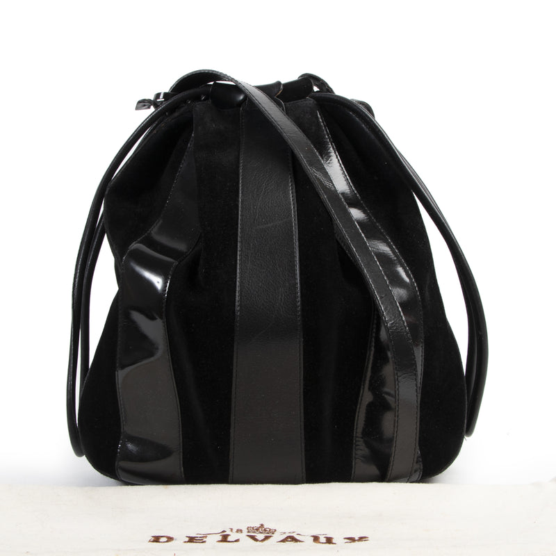 Buy and sell your authentic designer Delvaux Black Suede and Patent Drawstring Bag