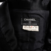 Buy an authentic second hand Chanel Créations-Paris 1971 Black Wool Tweed Jacket - Size 8 in very good condition at Labellov.com