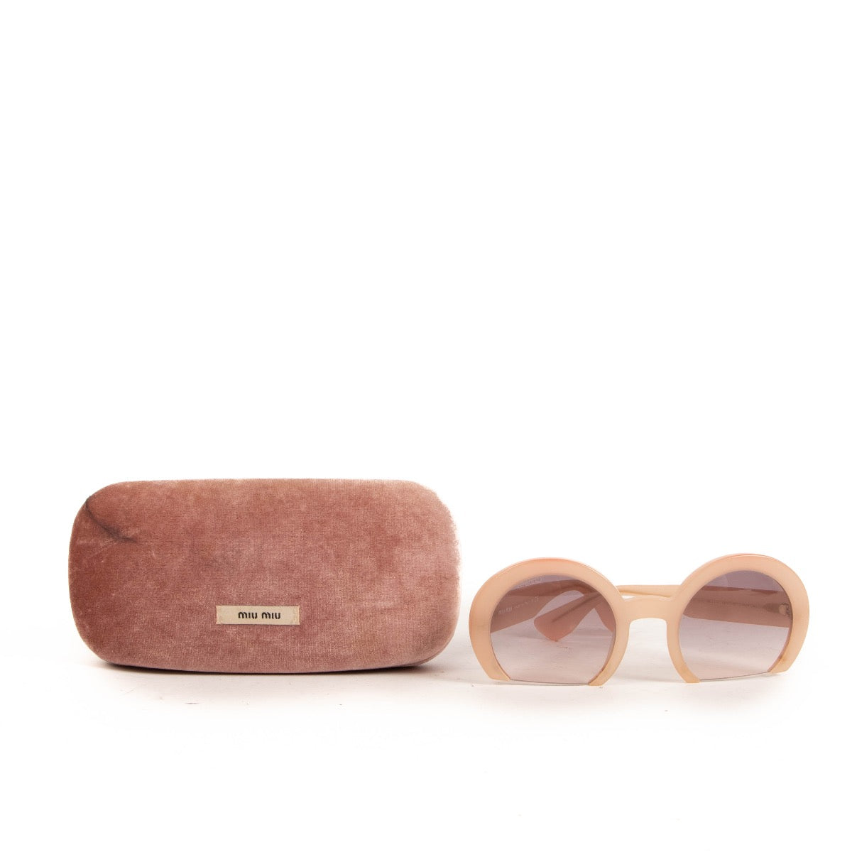 Shop safe online at Labellov in Antwerp, Brussels and Knokke these 100% authentic second hand Miu Miu Matt Pink Acetate Sunglasses