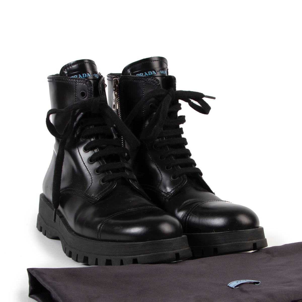 Veilig online kopen van authentieke zwarte Prada combat boots in maat 37,5.