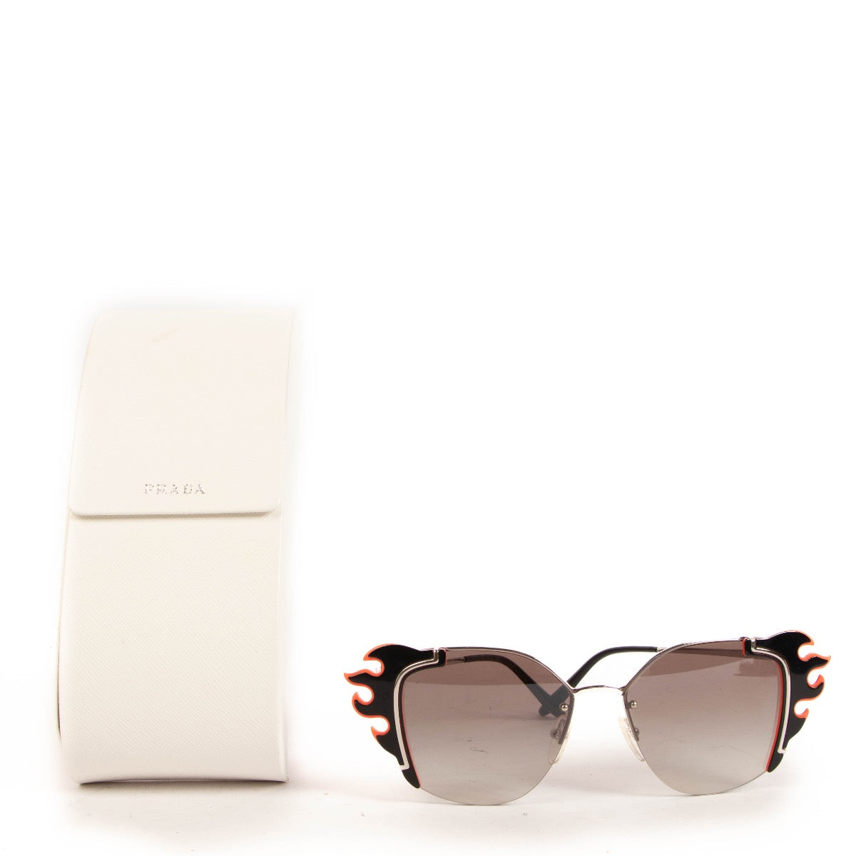 Shop safe online at Labellov in Antwerp, Brussels and Knokke these 100% authentic second hand Prada Black Flame Cat-eye Sunglasses