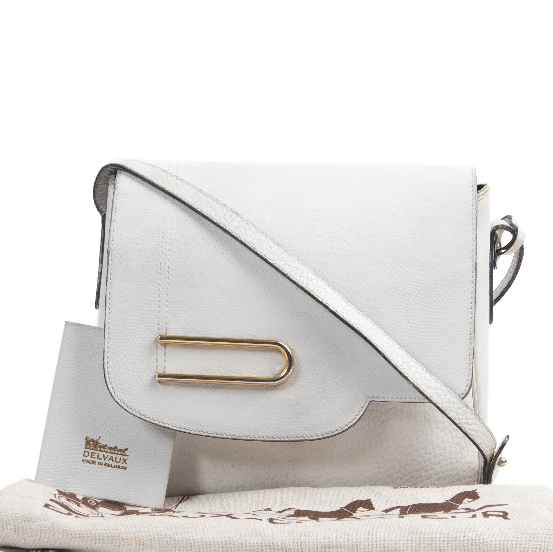 Delvaux White Leather Shoulder Bag. Authentieke tweedehands vintage Delvaux handtassen bij LabelLOV Antwerpen. Authentique seconde-main luxury vintage en ligne webshop LabelLOV. Authentic preloved vintage Delvaux handbags at LabelLOV Antwerp.
