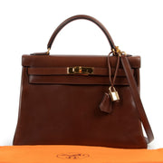Hermès Kelly 32 Noisette Brown Boxcalf GHW at Labellov online or in store available for a reasonable price and in good condition. Get them now!