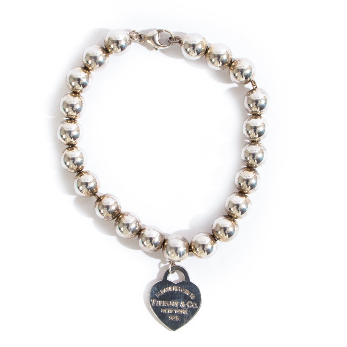 Shop safe online at Labellov in Antwerp this 100% authentic second hand Tiffany & Co Silver Heart Charm Bracelet