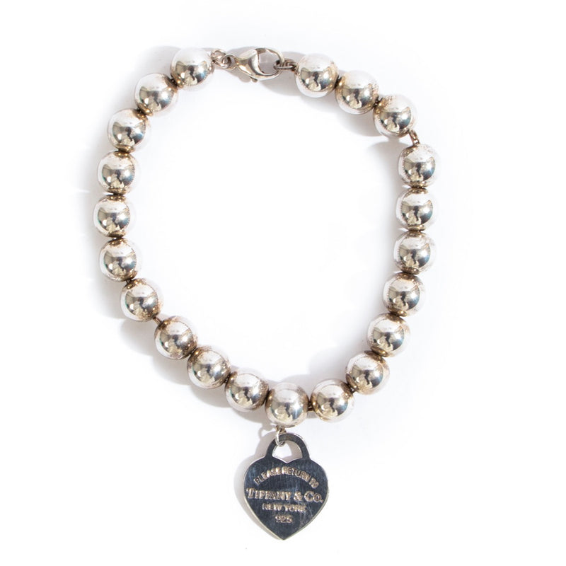 Shop safe online at Labellov in Antwerp this 100% authentic second hand Tiffany & Co Silver Heart Charm Bracelet