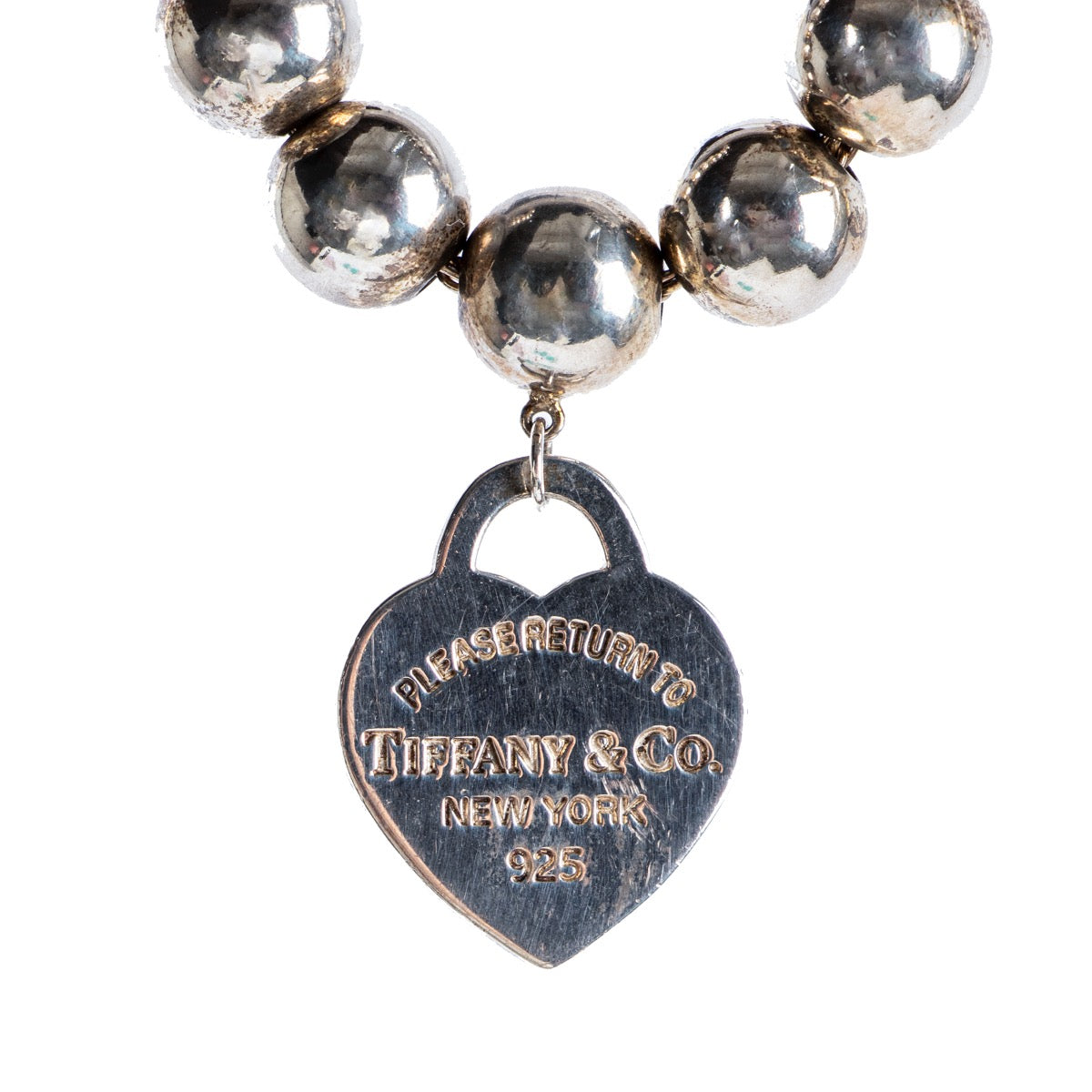 Shop safe online at Labellov in Antwerp this 100% authentic second hand Tiffany & Co Silver Heart Charm Bracelet