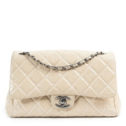 We buy and sell your authentic designer Chanel Cream Distressed Leather Flap Bag