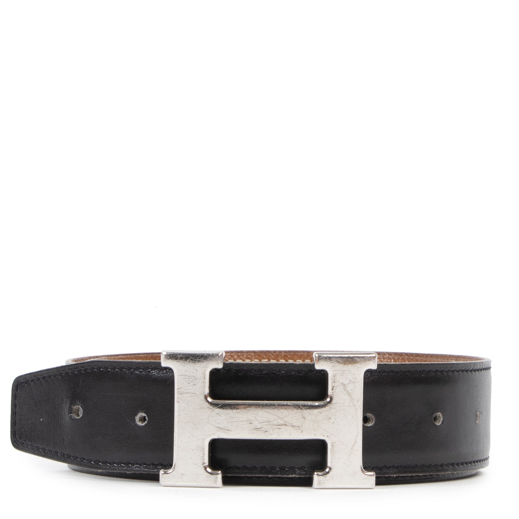 Hermès Reversible Black and Gold Leather Constance Belt aan de beste prijs bij Labellov