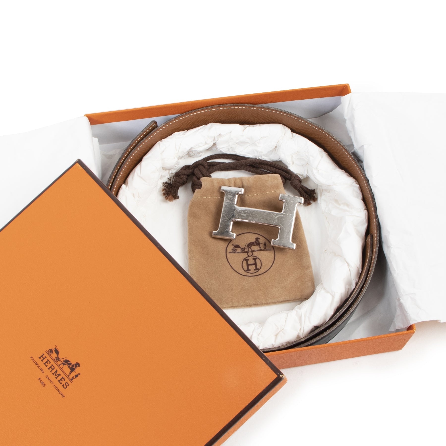 Hermès Reversible Black and Gold Leather Constance Belt for the best price at Labellov secondhand luxury