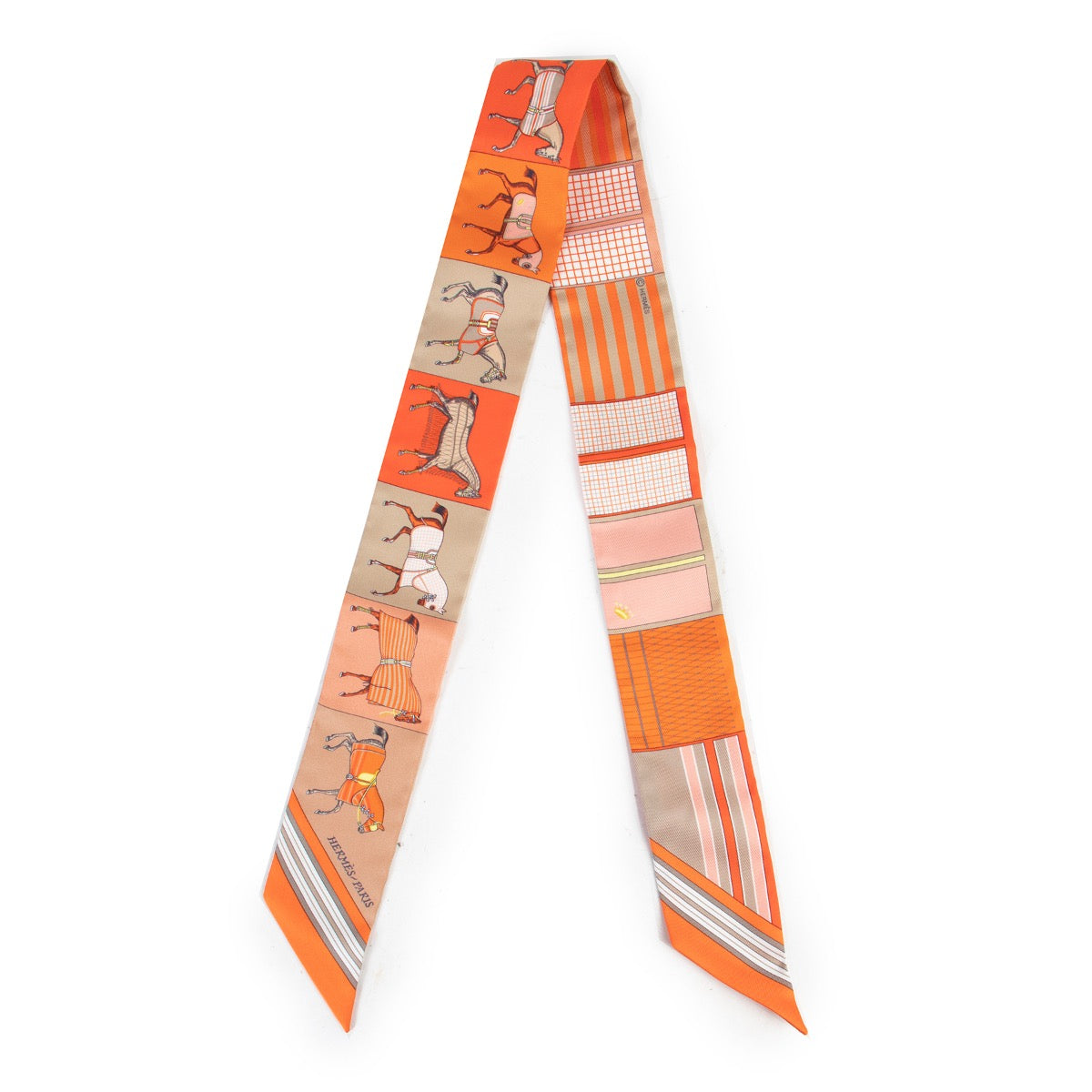 Buy online Hermès Orange Twilly Scarf in a safe way. Shop Hermès Orange Twilly Scarf in a safe way online. Buy vintage Hermès Orange Twilly Scarf online safely.
