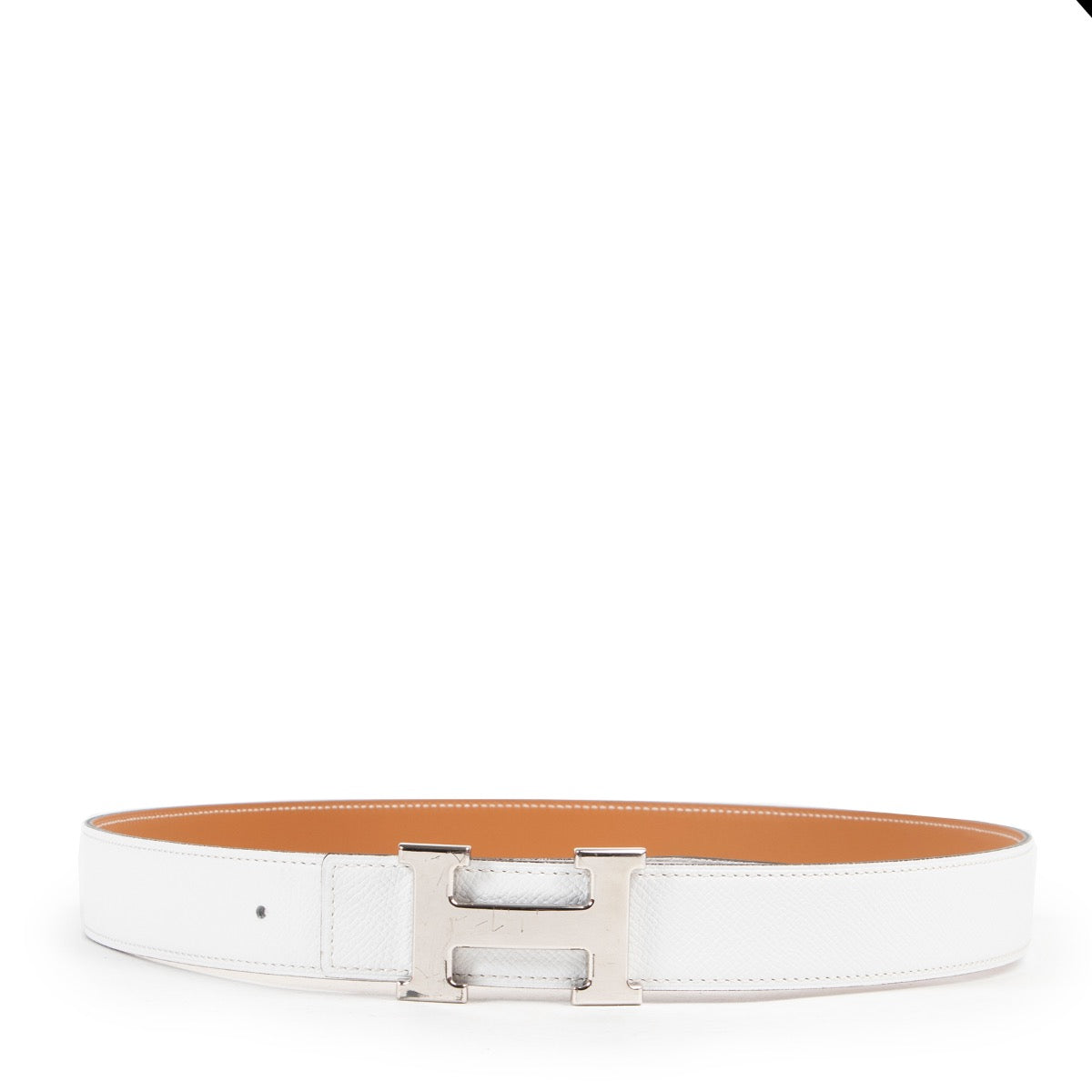 Buy online Hermès White Reversible Constance Belt in a safe way. Shop Hermès White Reversible Constance Belt online safely. Buy authentic second hand Hermès White Reversible Constance Belt in a safe way.