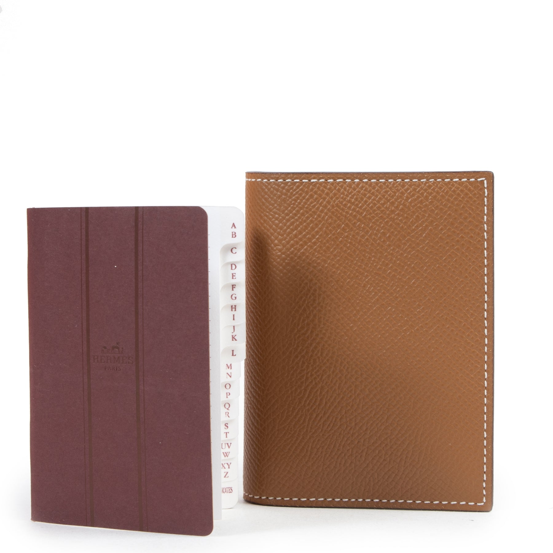 Hermès Brown Leather Mini Agenda. Authentieke tweedehands Hermès accessoires bij LabelLOV Antwerpen. Authentique seconde-main luxury en ligne webshop LabelLOV. Authentic preloved Hermès accessories at LabelLOV Antwerp.