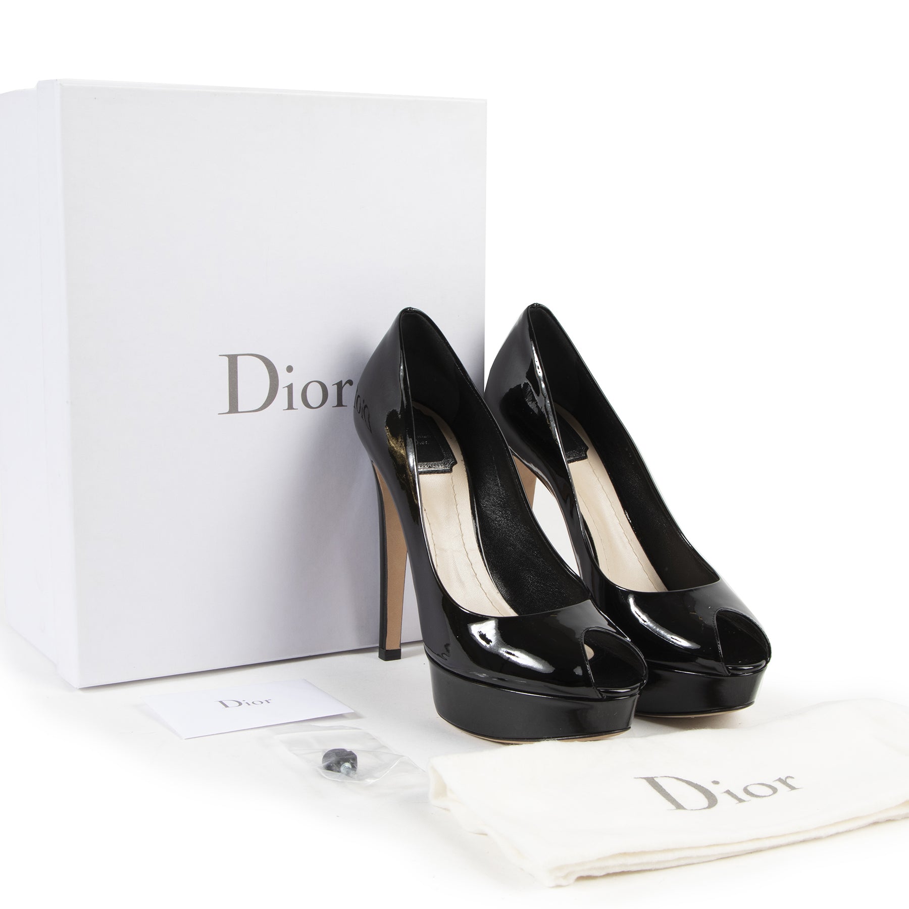 We buy and sell your authentic designer Christian Dior Black Patent Leather Platform Pumps
