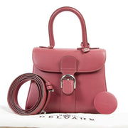 Bent u op zoek naar een authentiek exemplaars van de Delvaux Brillant Mini Rouge Blush + Strap?