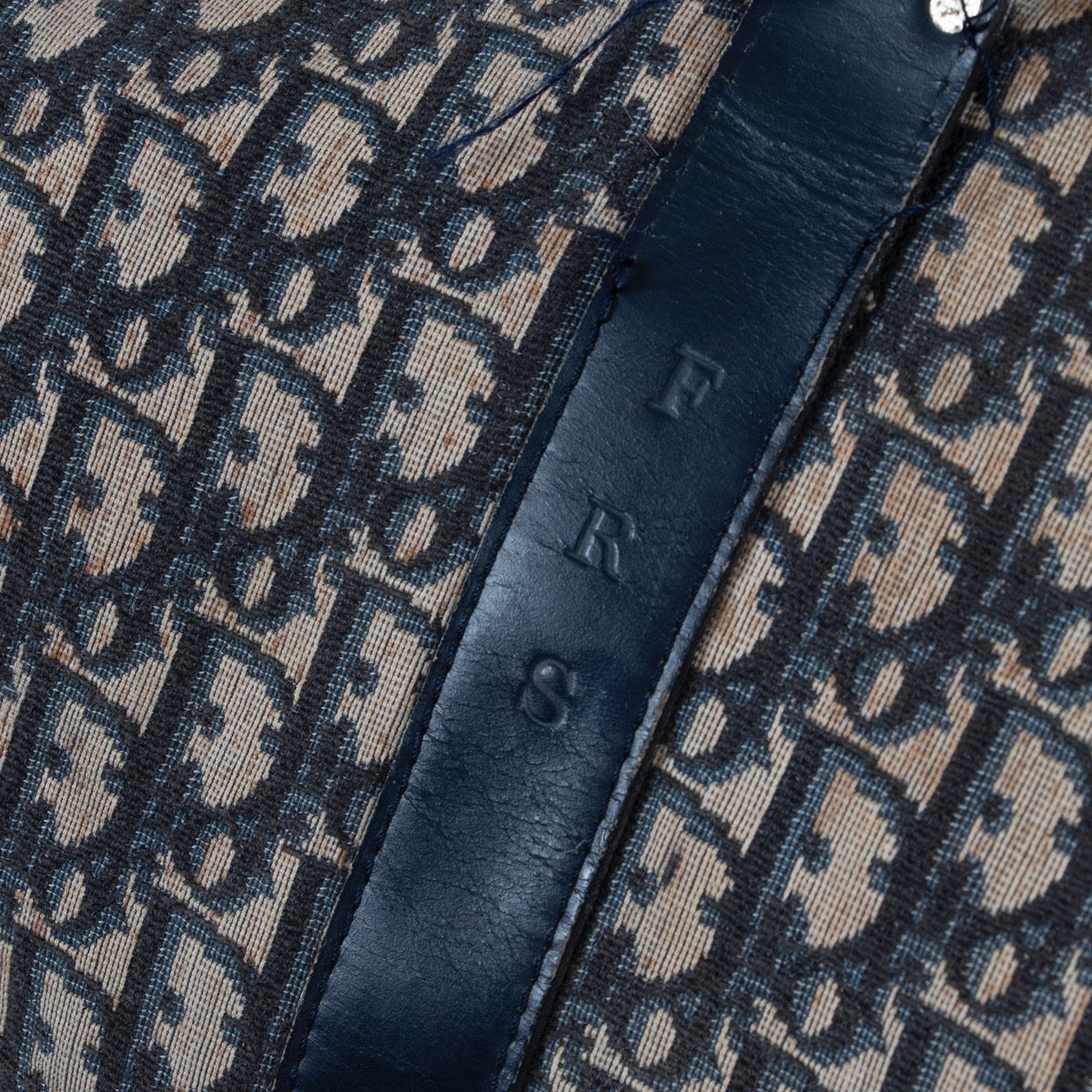 Shop safe online at Labellov in Antwerp this 100% authentic second hand Christian Dior Blue Monogram Travel Bag