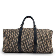 Shop safe online at Labellov in Antwerp this 100% authentic second hand Christian Dior Blue Monogram Travel Bag