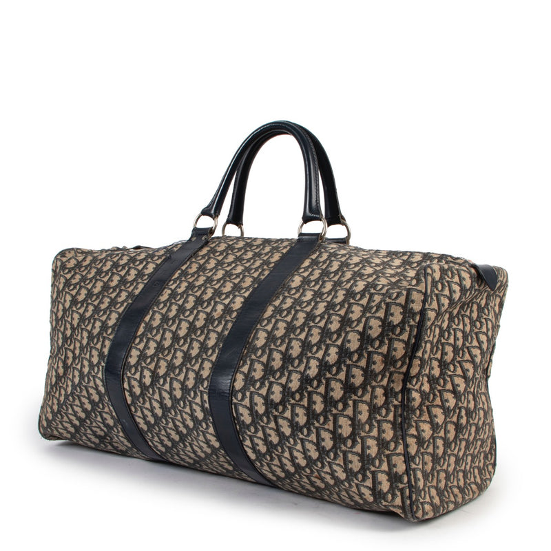 Shop safe online at Labellov in Antwerp this 100% authentic second hand Christian Dior Blue Monogram Travel Bag