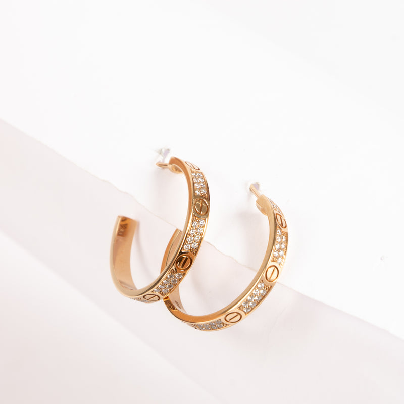 Shop the authentic Cartier Pavé Diamonds Rose Gold LOVE Medium Hoop Earrings on Labellov.com !
