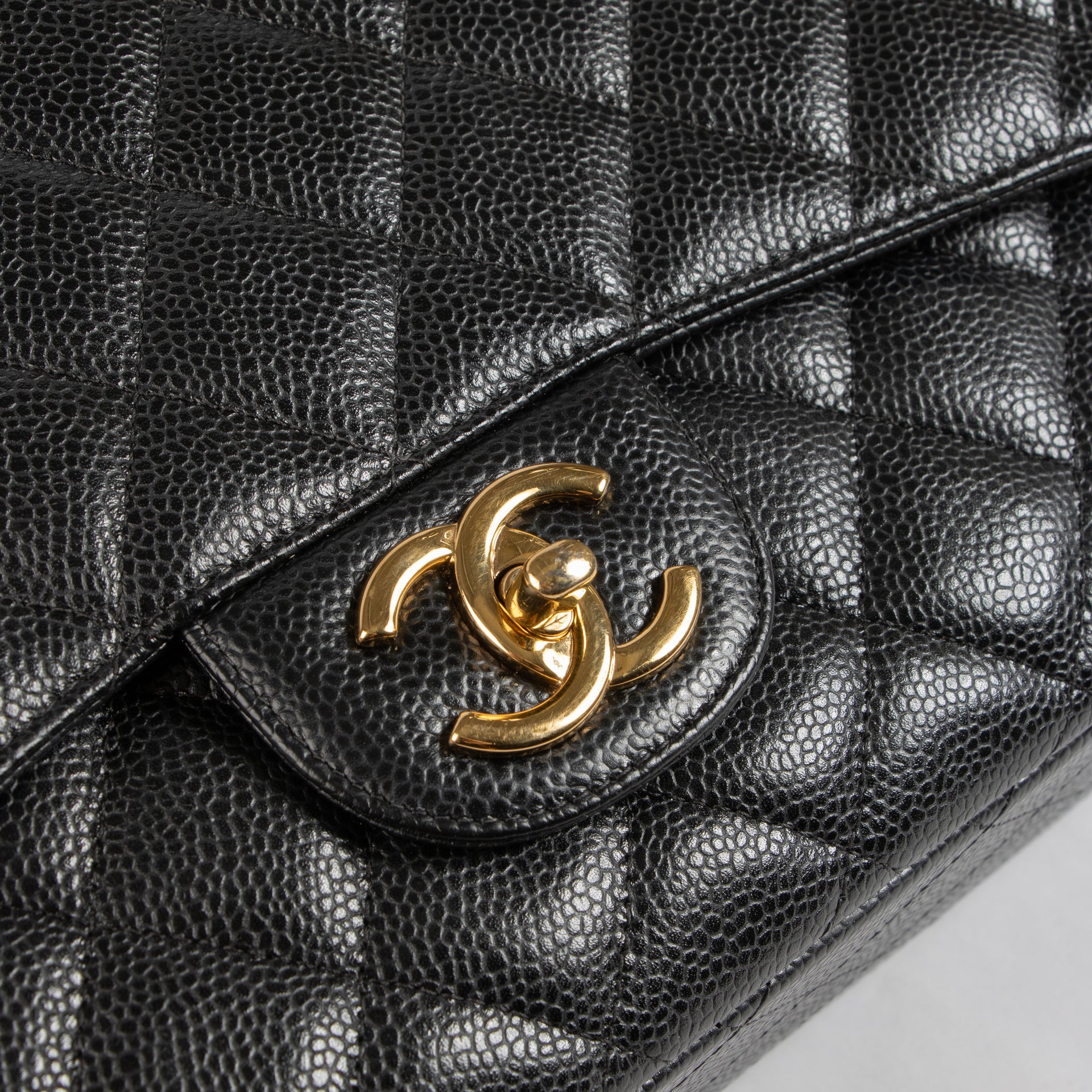 Shop the authentic Chanel Black Caviar Maxi Classic Flap Bag on Labellov.com !