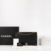 Shop the authentic Chanel Black Caviar Maxi Classic Flap Bag on Labellov.com !