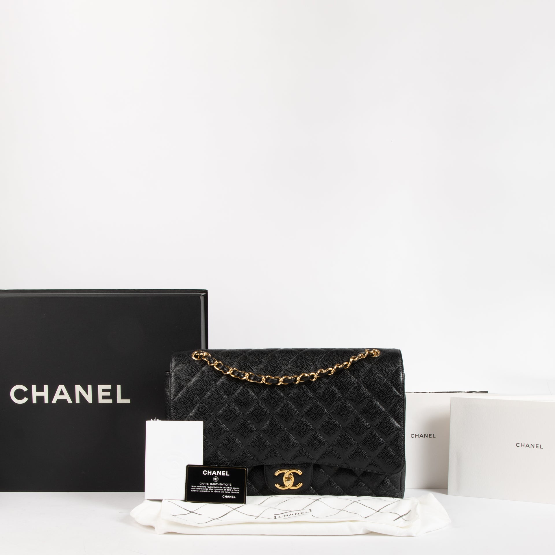 Shop the authentic Chanel Black Caviar Maxi Classic Flap Bag on Labellov.com !