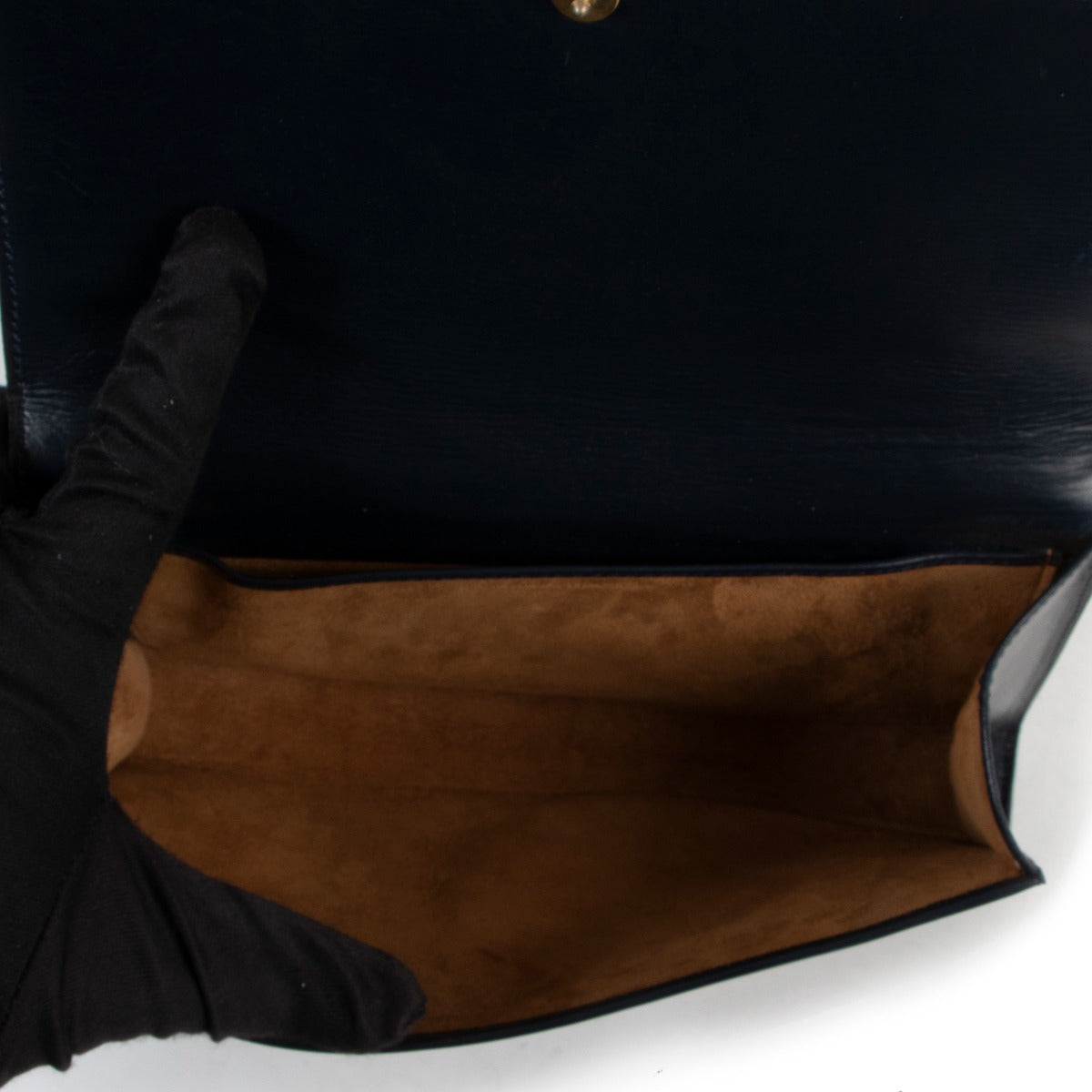 Delvaux Blue Clutch with Gold Circle Design now available at Labellov. Buy and sell designer vintage items for a reasonable price