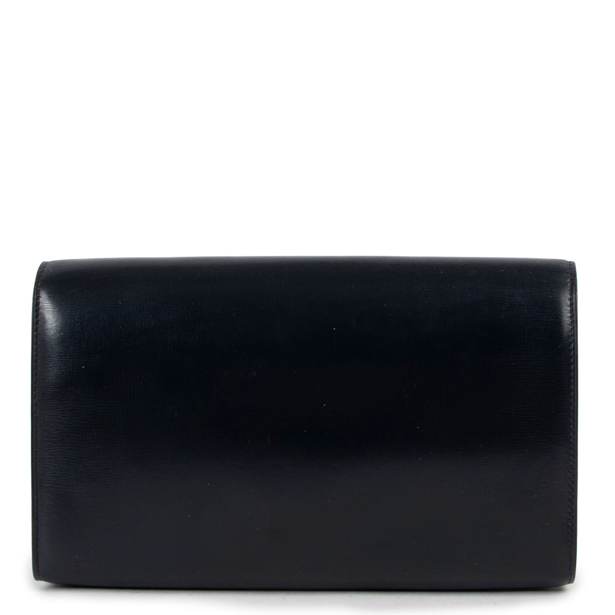 Delvaux Blue Clutch with Gold Circle Design now available at Labellov. Buy and sell designer vintage items for a reasonable price