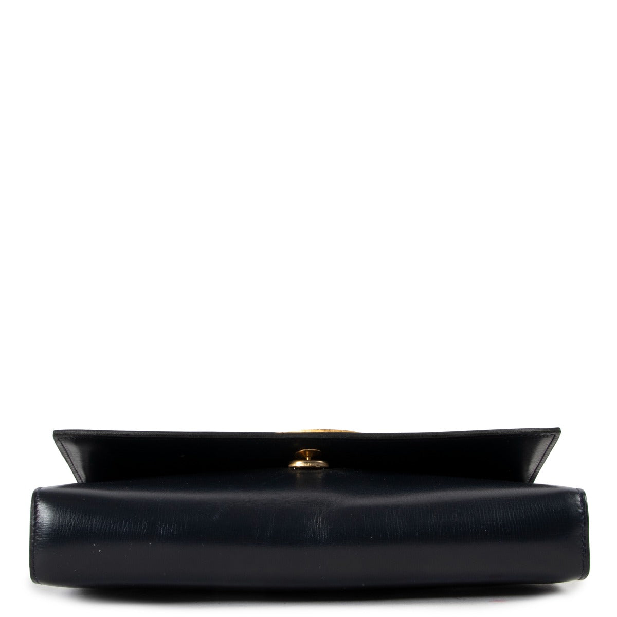 Delvaux Blue Clutch with Gold Circle Design now available at Labellov. Buy and sell designer vintage items for a reasonable price