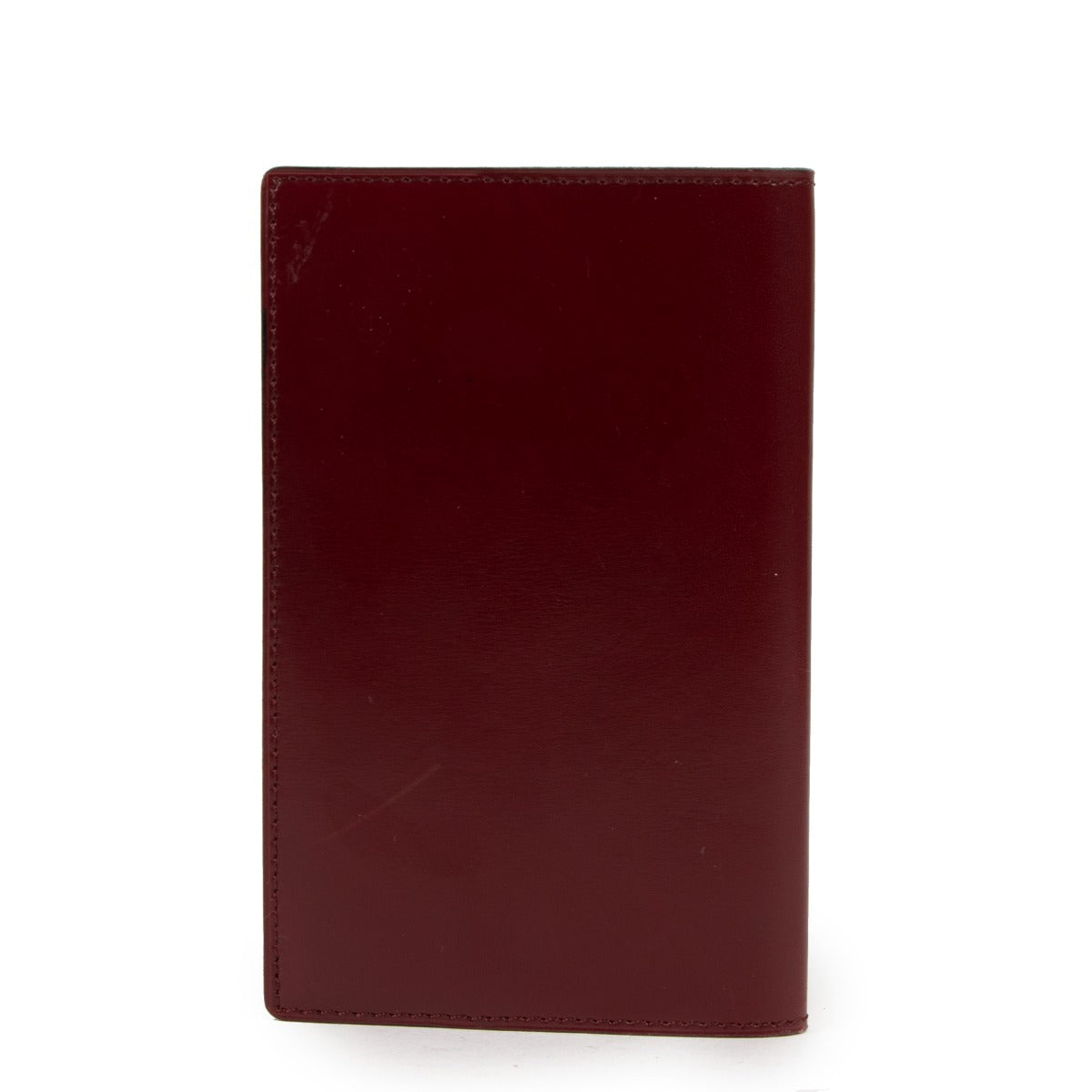 Delvaux Burgundy Address Book vintage. Available now at Labellov secondhand Delvaux Burgundy Address Book for a reasonable price and in good condition. Buy online, at our online shop. 100% authenticity guaranteed