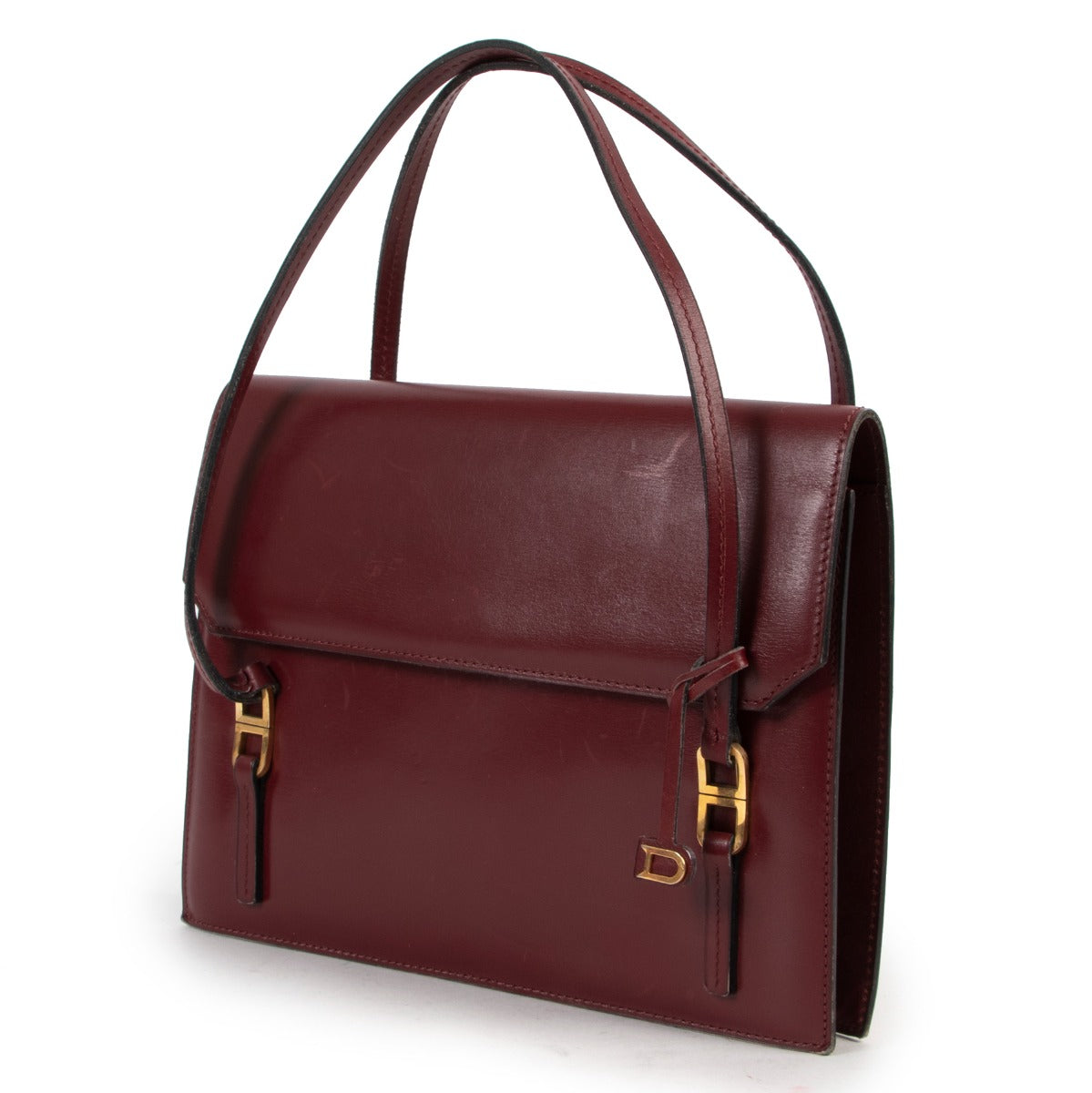 Available now at Labellov Delvaux Burgundy Top Handle for a reasonable price and in preloved condition. Buy vintage and secondhand delvaux bags