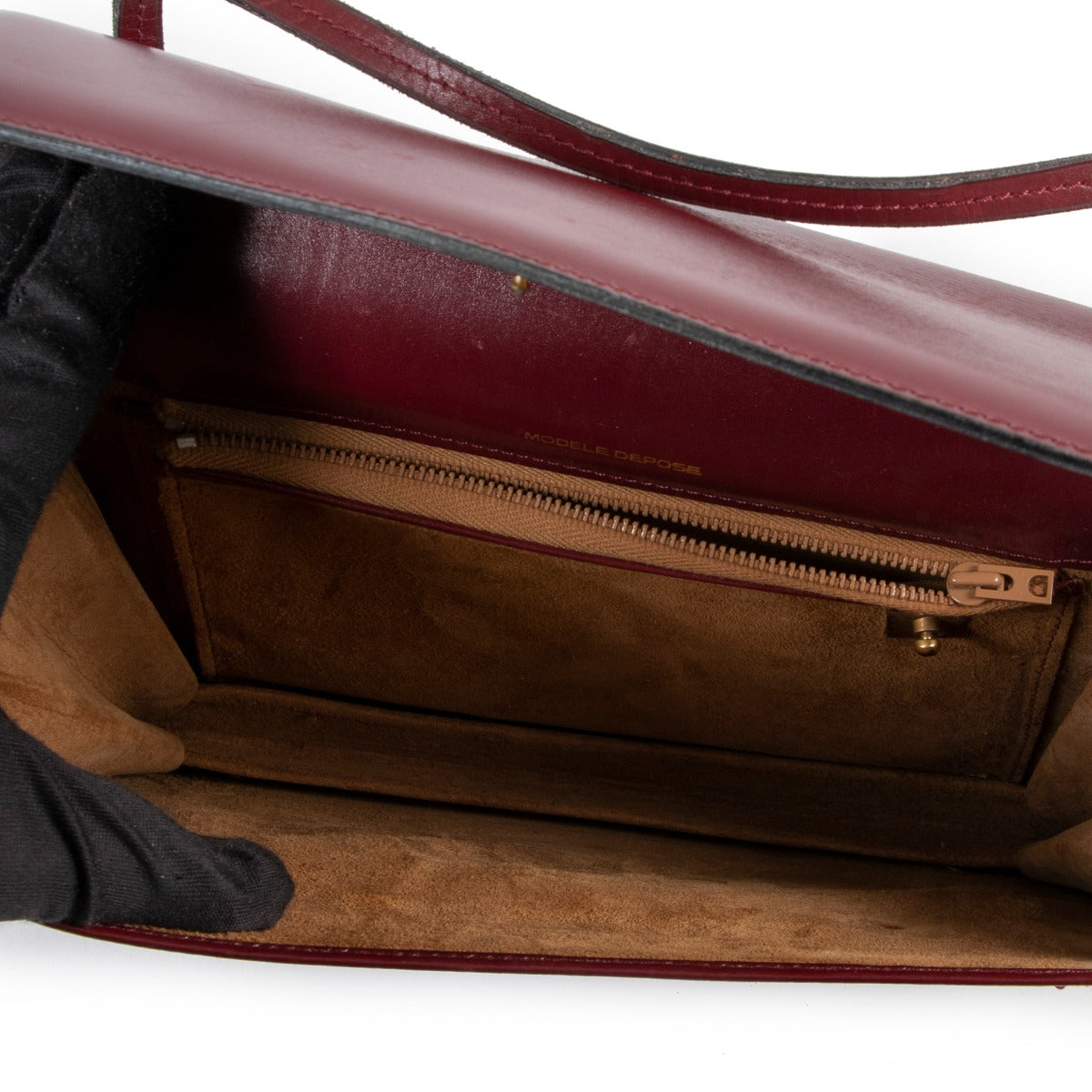 Available now at Labellov Delvaux Burgundy Top Handle for a reasonable price and in preloved condition. Buy vintage and secondhand delvaux bags