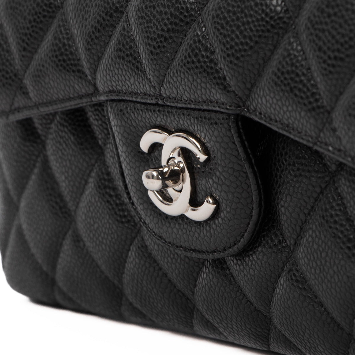 Shop 100% authentic second-hand Chanel Black Caviar Classic Flap Bag on Labellov.com