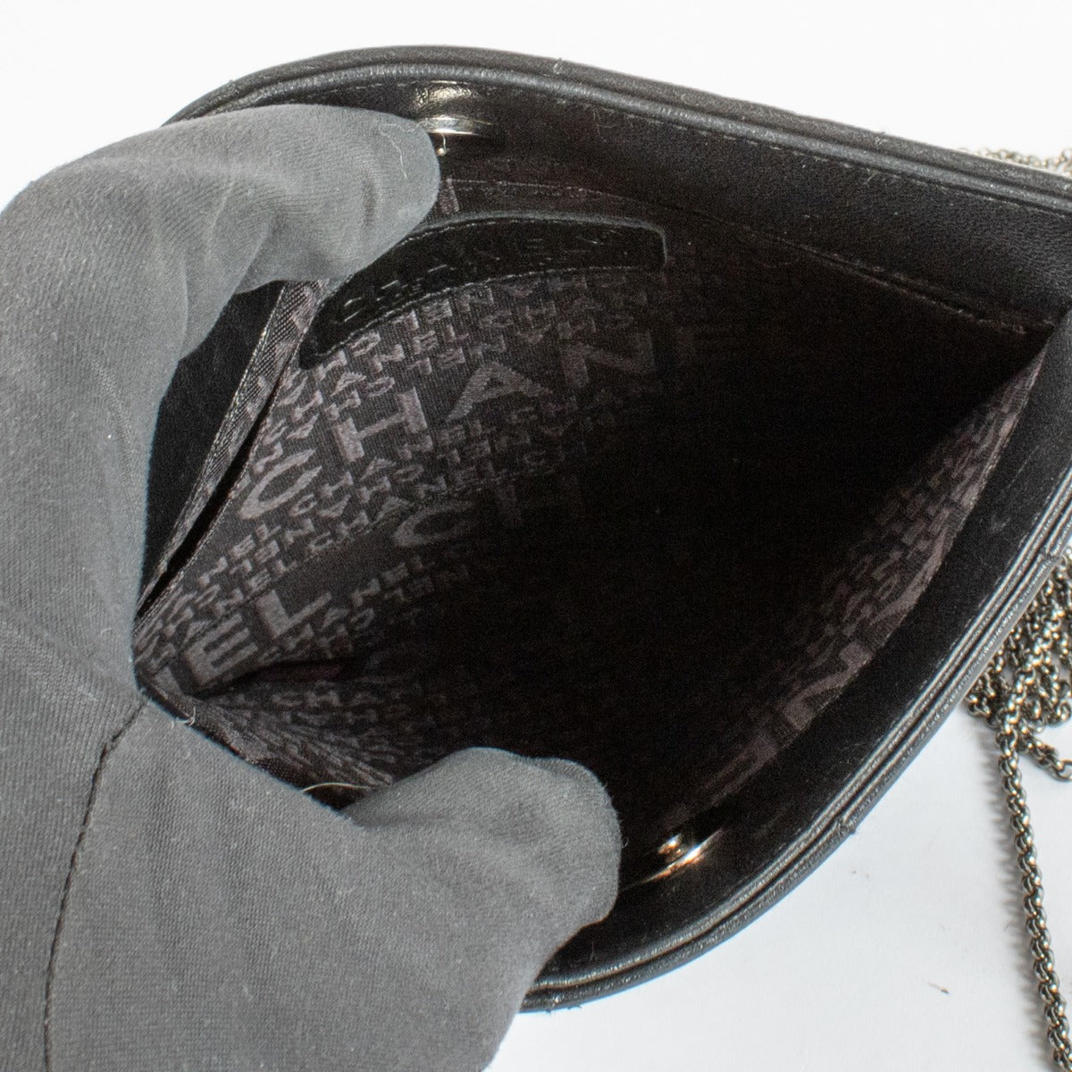 Authentic preloved Chanel 2002 Vintage Fringe Chain Black Quilted Crossbody Bag on Labellov.com