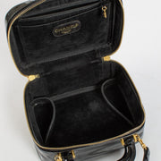 Shop 100% authentic second hand Chanel Black Patent Vintage Vanity Case on Labellov.com