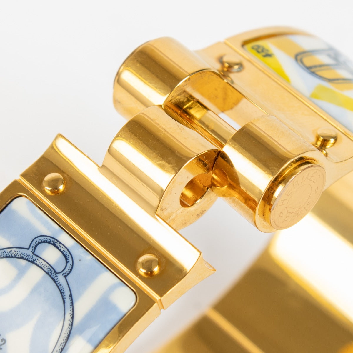 Authentic pre-loved Hermès Gold Enamel Hinged Bracelet on Labellov.com