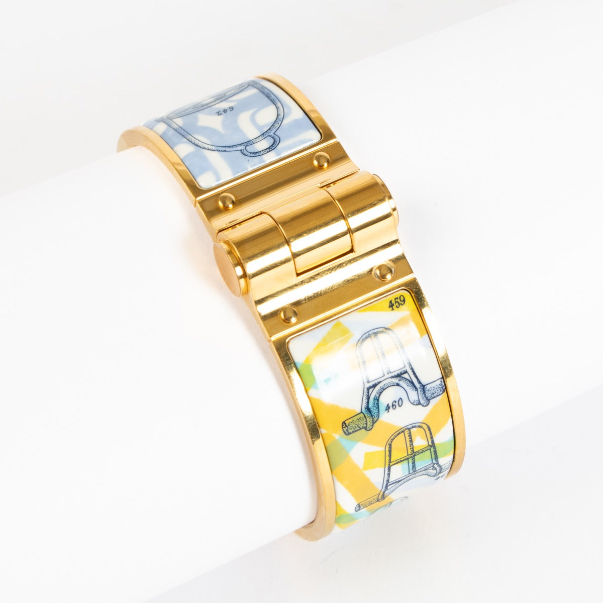 Authentic pre-loved Hermès Gold Enamel Hinged Bracelet on Labellov.com