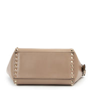 Valentino Garavani Nude Rockstud Small Leather Trapeze Bag