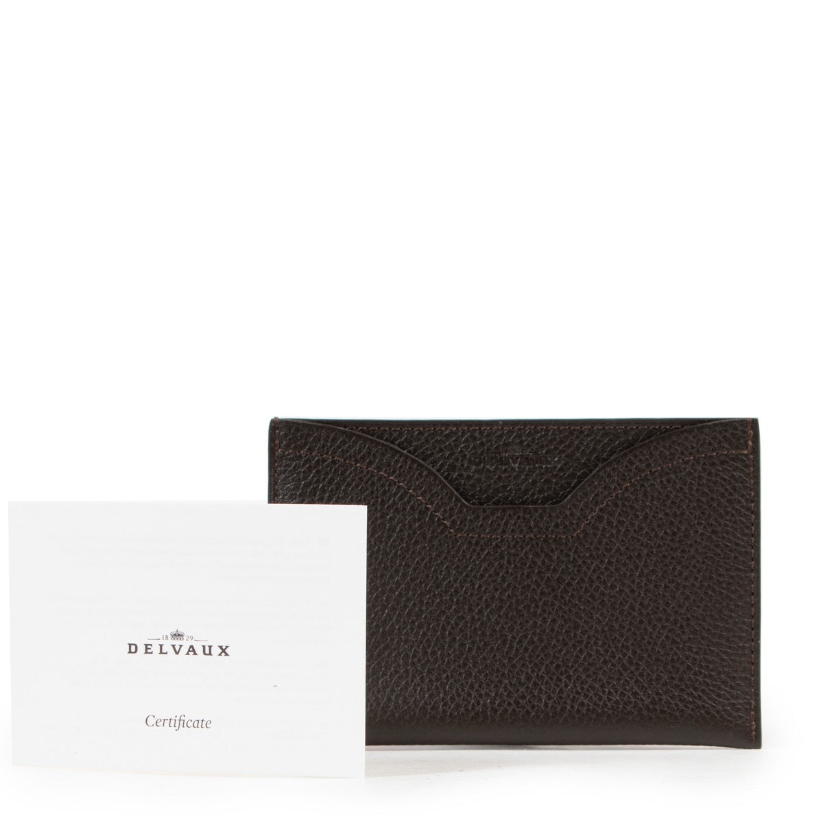 Achetez en ligne en toute sécurité le porte-carte Delvaux brune Windsor Jumping authentique.